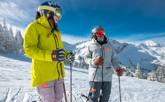 man and woman skiing with Leki poles