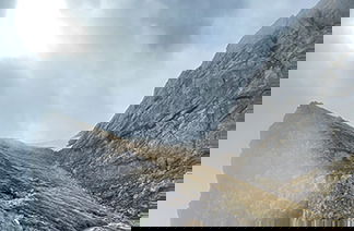 Sonne hinter Berg Aggenstein 